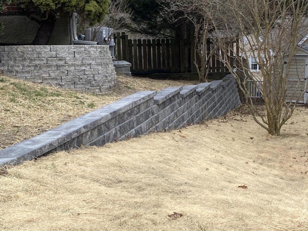 What is the purpose of a retaining wall